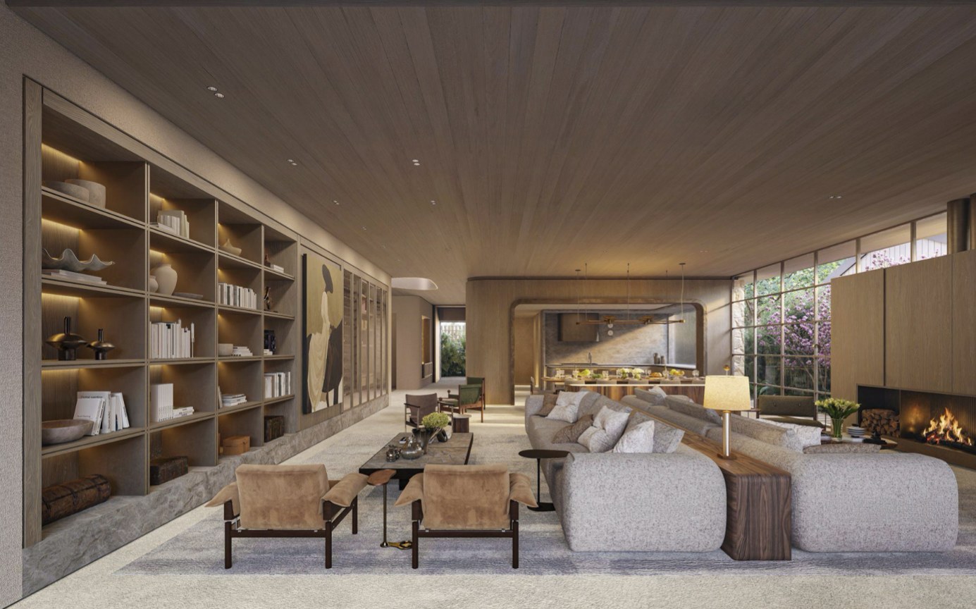 Living room with a full-height stone fireplace wall